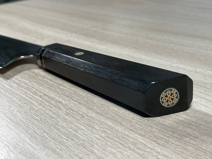 Kiritsuke Santoku, primo piano del manico in legno